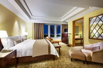 Palladian-Suite-Bedroom-The-Fullerton-Hotel-Singapore.jpg
